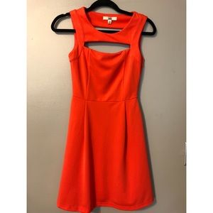 Orange dress with peakboo neckline. Extra small